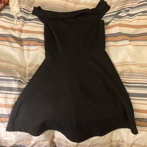 Size small black lulus dress. This has a skater cut that flows off the shoulder.
